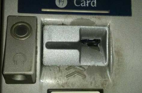 Here is a card skimmer in place. You might think it's rather obvious but to the untrained eye or someone that isn't thinking about it may think otherwise