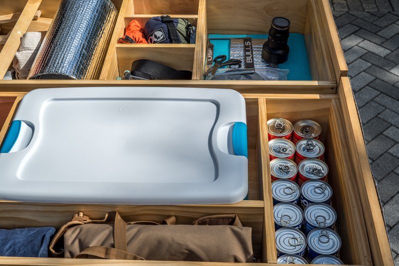 the-drawers-underneath-the-memory-foam-mattress-hold-his-camping-gear-food-and-other-supplies